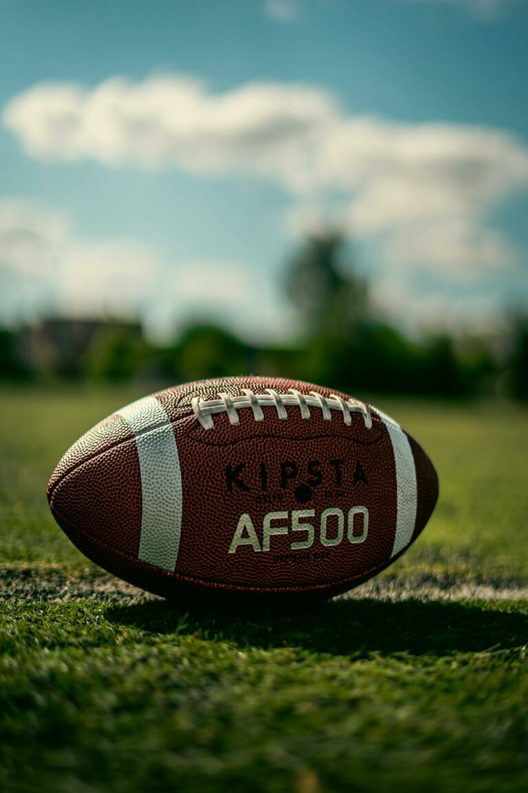 An Oval Football on Grass